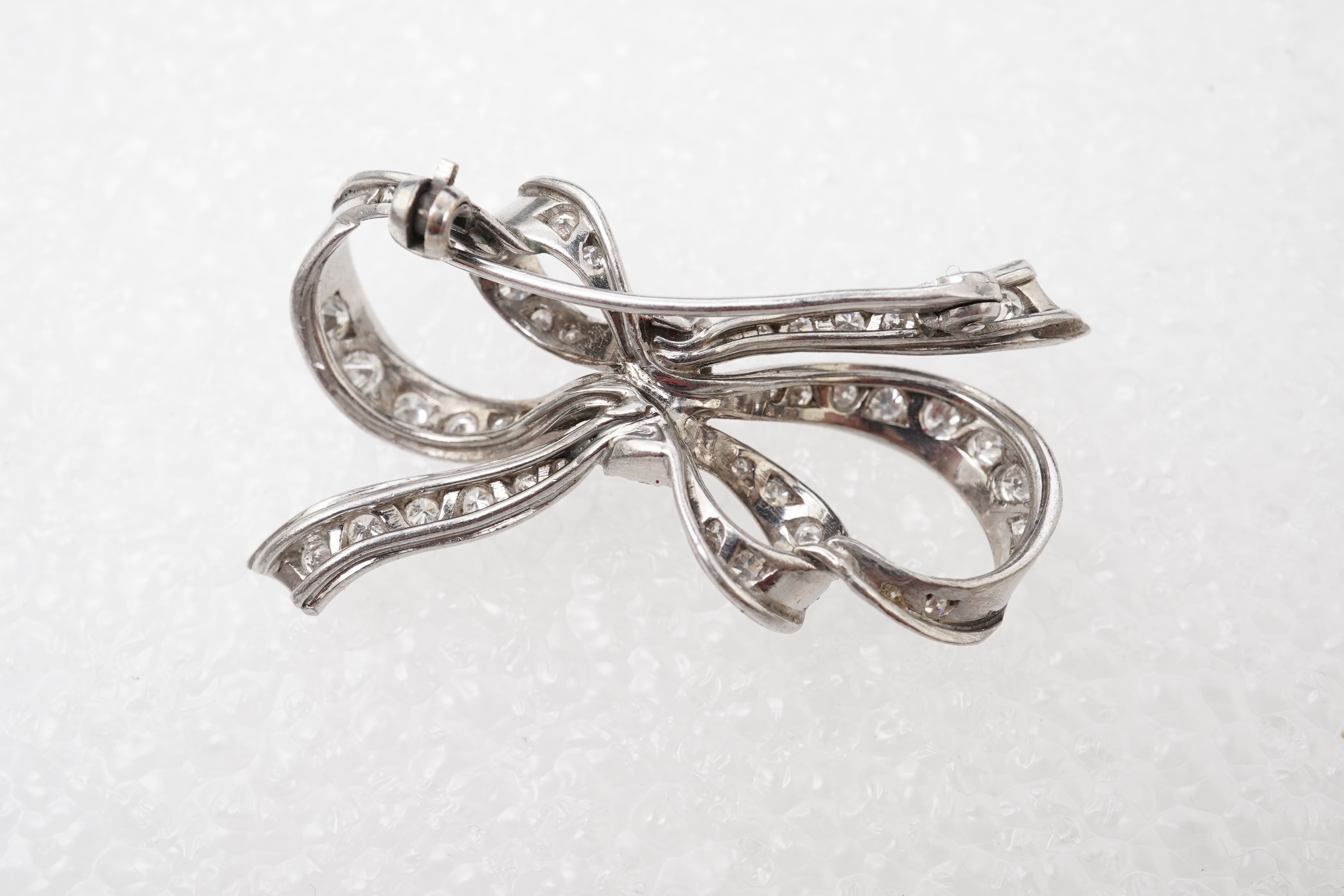 Two diamond brooches, mid 20th century